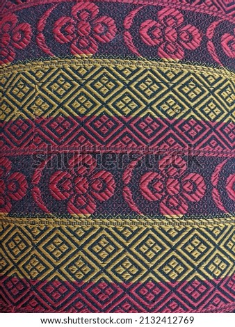 Different types of pattern stitched in red and yellow color