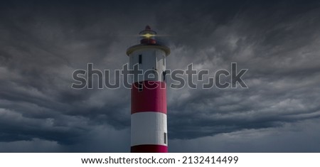 lighthouse damaged in a passing storm 