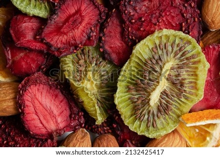 Close up of Natural Dried fruit slices snac. Dried Strawberry, Kiwi, Oranges for baking. Dehydrated dry fruit. Isolated white background.  Royalty-Free Stock Photo #2132425417