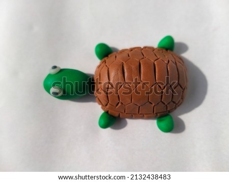 plasticine turtle isolated on white background.