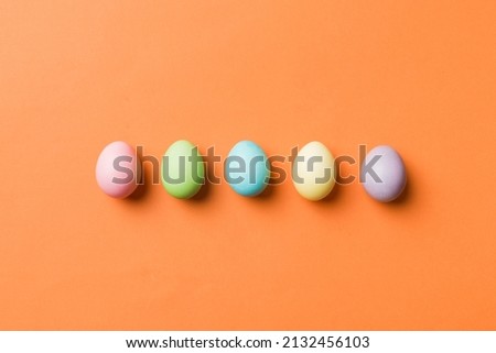 holiday preparation Multi colors Easter eggs on colored background . Pastel color Easter eggs. holiday concept with copy space.