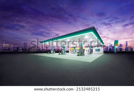 Petrol gas station at night with city building  Royalty-Free Stock Photo #2132485215