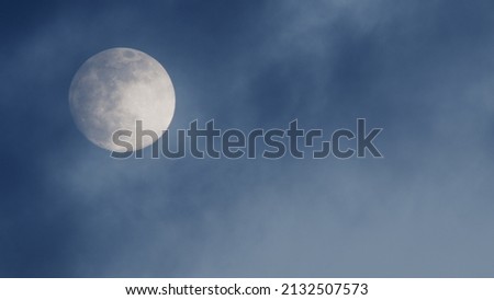 Photograph of Full Moon in the clear sky.