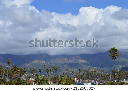 Beautiful Santa Barbara mountains, palm trees, clouds before the rain storm