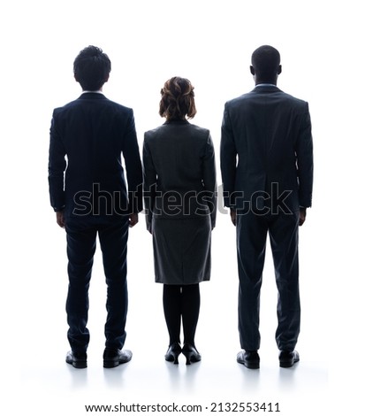 Silhouette of group of multinational businessperson rear view. Royalty-Free Stock Photo #2132553411