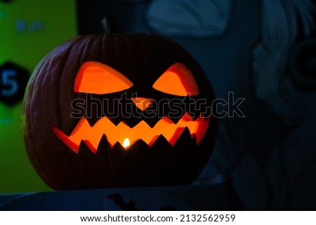 Pumpkin for halloween illuminated by candles from the inside