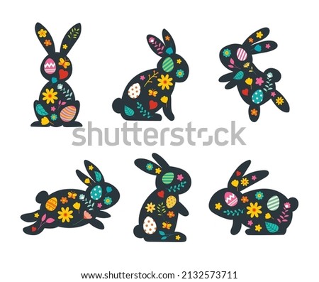 Happy easter rabbits and decorated with flowers.