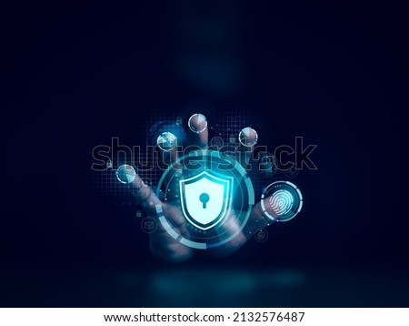 Shield lock button and personal information, finance, mail, phone icons on hand while scanning by five fingers to access. Cyber security, data protection, and business privacy technology concept. Royalty-Free Stock Photo #2132576487