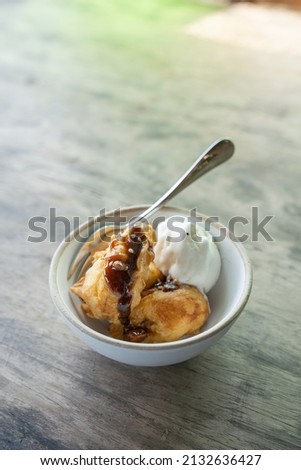 fried banana fritter with vanilla ice cream