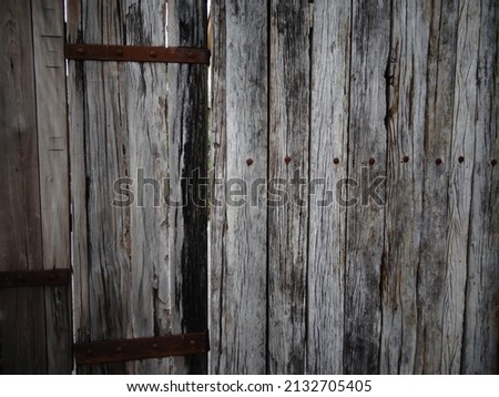 An old wooden door partial, abstract pattern for the background