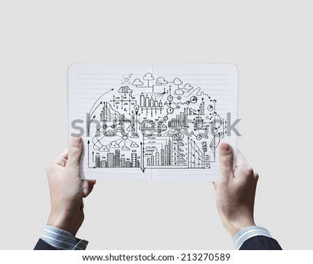 Close up of businessman hands holding opened notepad with sketches