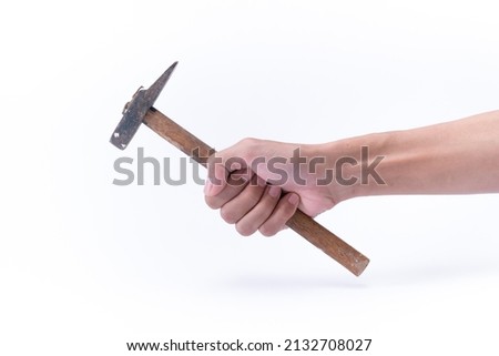 a man's hand holding a hammer isolated on white background