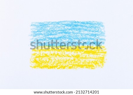 Ukrainian flag painted on white paper with wax crayons, closeup