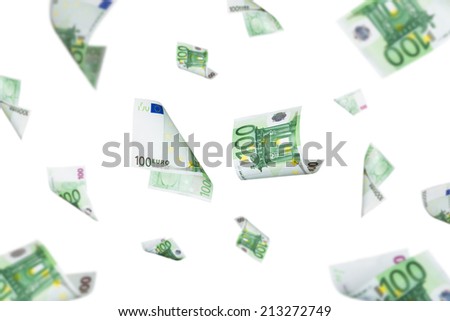 Euro banknotes falling down, isolated on white background.