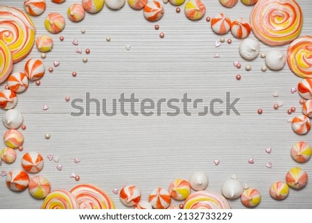 Tasty appetizing Party Accessories Happy Birthday Sweet Treat Swirl Candy Lollypop  on Background Top View Fashion Conceptual Holiday Flat Lay