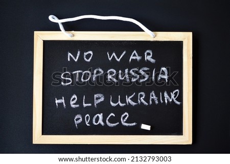 inscription on the board no war stop russia help ukraine peace