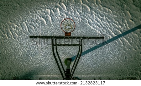 frigid cold above the basketball hoop