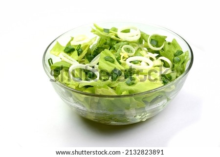 Mix salad. Vegetable salad bowl isolated on white background