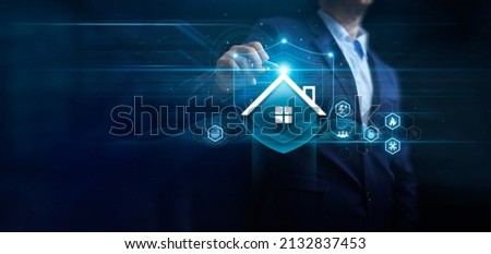 Businessman hand draw home insurance protection shield with safety network connecting icons. Property insurance security concept to protect family, real estate from accidents and unexpected disaster. Royalty-Free Stock Photo #2132837453