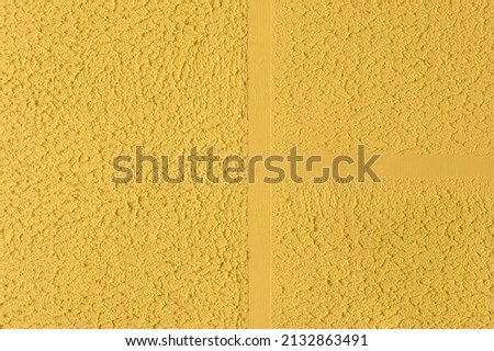 Yellow Plaster Wall Texture Design Rough Pattern Abstract Stucco Background.