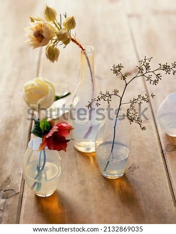 Glass FLowers on Wood Background