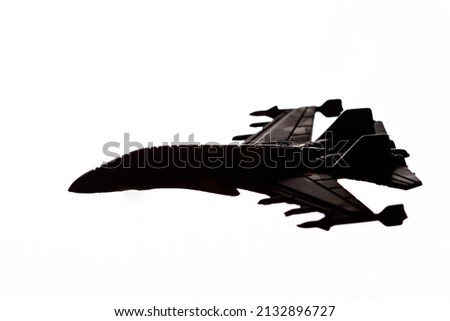 Jet fighter airplane silhouette isolated on white background.