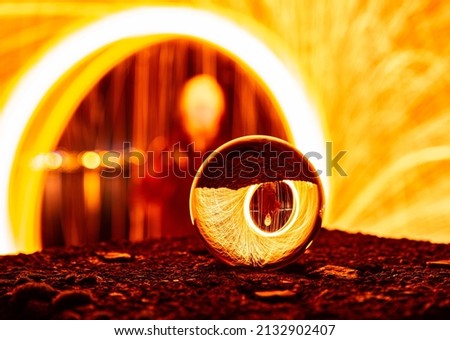 A closeup of the fiery ball with reflecting lights