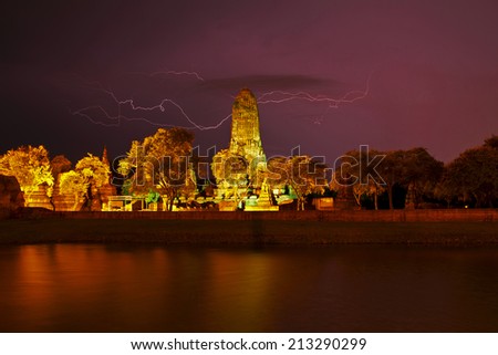 Dark Clouds. Thunderstorm with lightning in the night at the Rama temple (Wat Phra Ram) on with lighting,Ayutthaya province,Thailand 