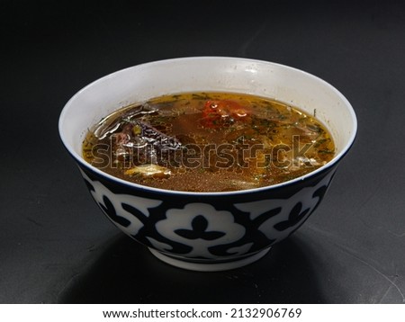 Uzbek traditional cuisine - Shurpa coup with meat Royalty-Free Stock Photo #2132906769
