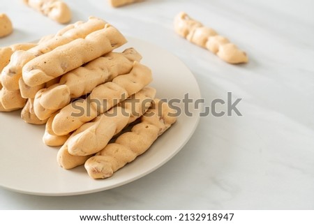 almonds meringue stick on plate - French snack dessert style