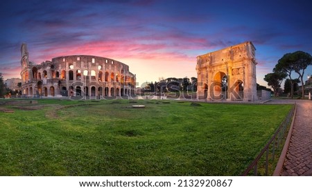 Colosseum, Rome, Italy. Panoramic image of iconic Colosseum and Arch of Constantine in Rome, Italy at beautiful sunrise.