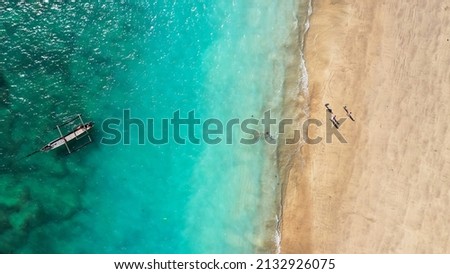 Aerial azure sea around International Airport. Jimbaran beach bali on background scenery blue sky with clouds. Bali, Indonesia Royalty-Free Stock Photo #2132926075