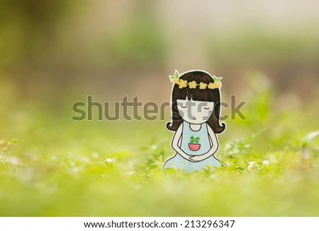 Cute little girl meditating on green grass ,creative design paper cut.