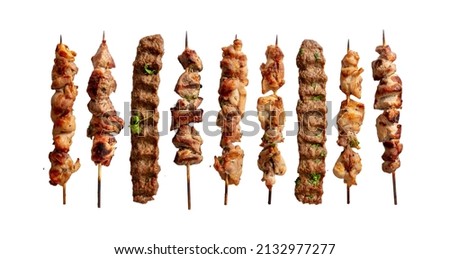 Grilled meat skewers variety isolated on white, Souvlaki chicken and pork, kebab doner. Greek grill food, top view. Design element
