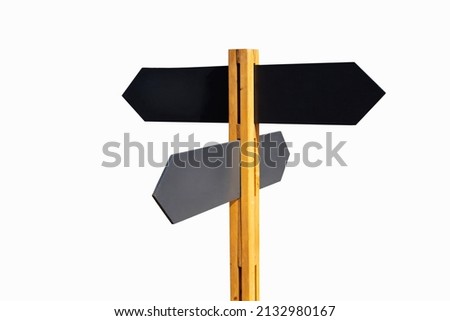 Black pointers in the form of arrows on a wooden pole. Signs with four directions on a white background. Preparation for the designer. Isolate on white background