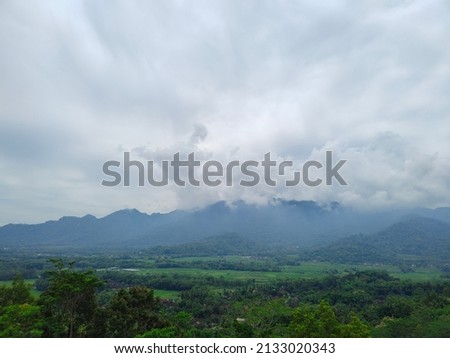 Panorama of beautiful countryside in sunny afternoon landscape with white cloud blue sky taken from tower