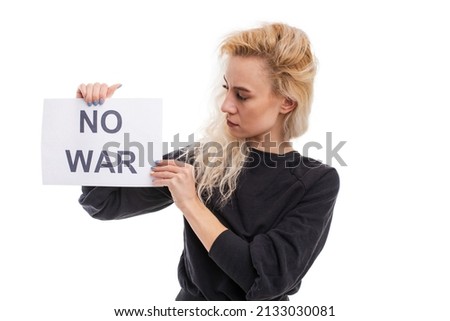 No war. A young woman holds poster in her hands on a white background