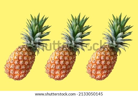 Top veiw, Set three pineapple ripe isolated on pastel yellow background for stock photo or design advertising product, wallpaper,thai fruit summer