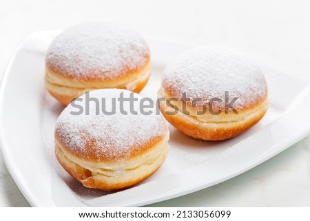 donuts filled with apricot jam Royalty-Free Stock Photo #2133056099