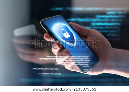 Mobile data fraud with phone. Cybersecurity hacker. Scam, phishing and online crime. Ransomware, antivirus, malware or spyware security firewall app. Identity thief and scammer with smartphone. Royalty-Free Stock Photo #2133073561