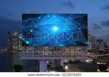 Information flow hologram on road billboard, night panorama city view of Singapore. The largest technological center in Southeast Asia. The concept of programming science.