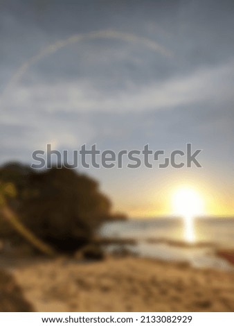 defocused photo,sunset on a beach at dusk,photo for background