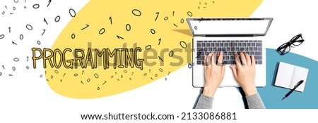 Programming with person using a laptop computer