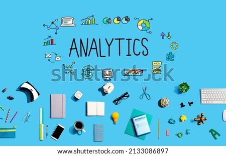 Analytics theme with collection of electronic gadgets and office supplies