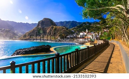 Scenic Madeira island, natural swimming pools of charming Porto da Cruz village. Popular tourist resort in Portugal Royalty-Free Stock Photo #2133102393