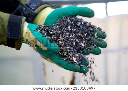 Plastic granulate in a plastic waste recycling plant Royalty-Free Stock Photo #2133103497