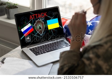 Computer hacker or Cyber attack concept background with Ukraine flag and the Russian bear-hacker Royalty-Free Stock Photo #2133106757