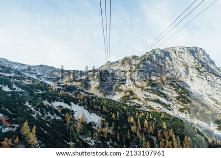 Dachstein Mountains, 5 fingers mountain lift, mountain view in autumn. View of the descending lift