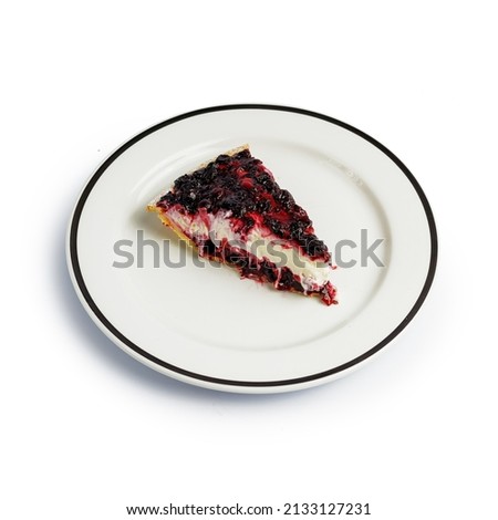 Dessert cake on a color plate. Top view. Copy space. isolated on white