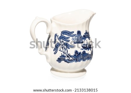 Vintage Jug. Antique Rustic Kitchenware Tableware Ceramic Milk Jug. Pastoral Country Style Blue and White Pot Pitcher. Old Blue and White Willow Pattern Cream Jug. Pen Tooled Clipping Path in JPEG